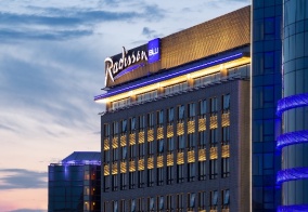 Отель Radisson Blu Olympiyskiy Hotel Moscow в Москве